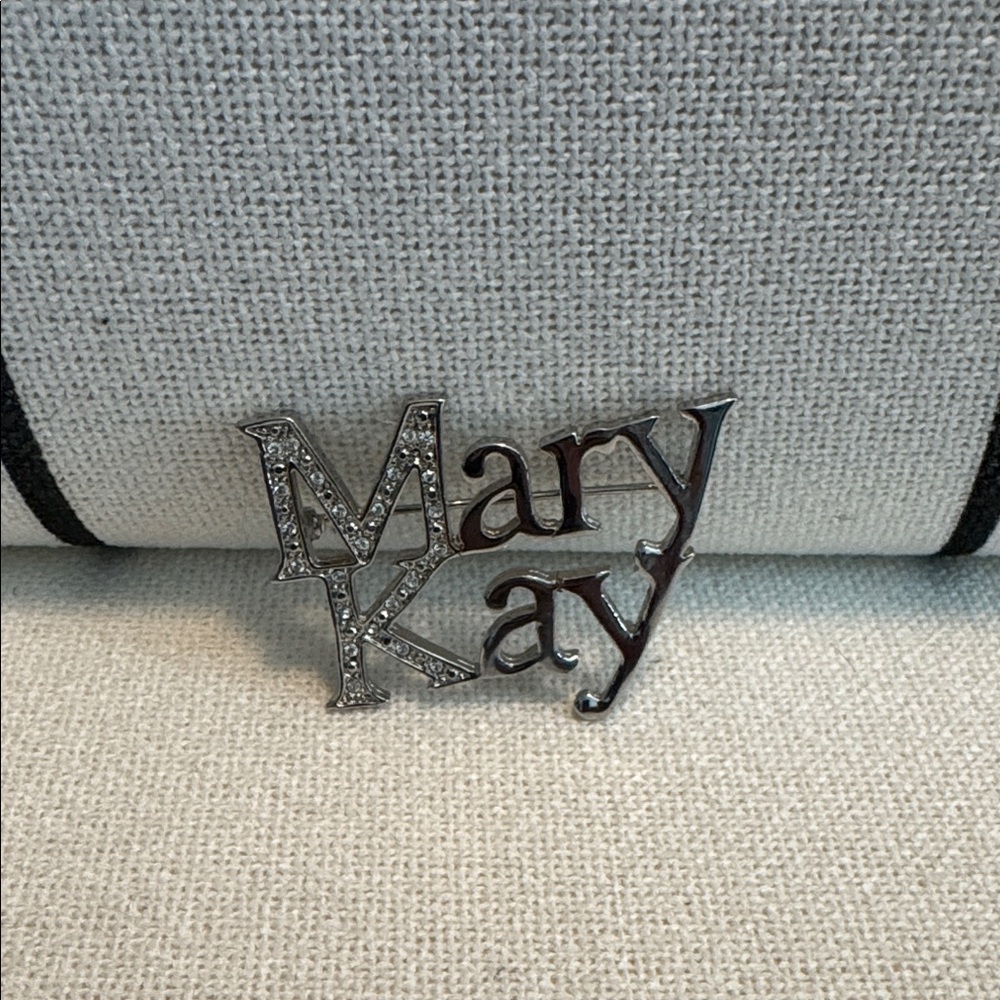 Mary Kay Clear Rhinestone Logo Pin in Silver
